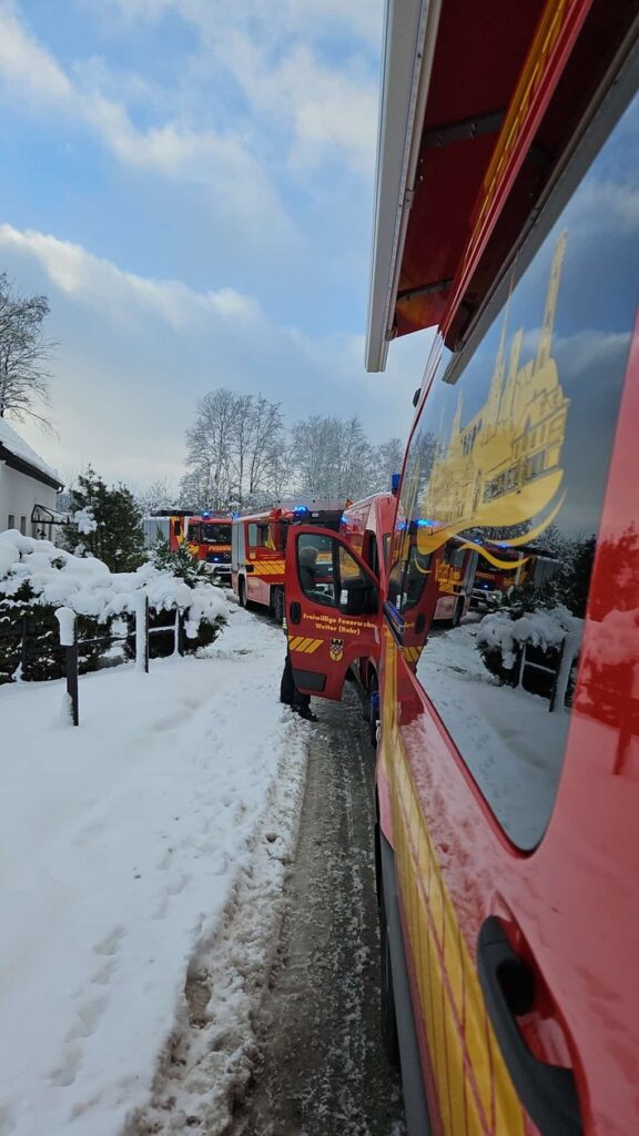 Fahrzeugaufstellung im Schnee